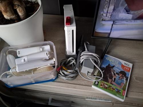 Oude Wii spelcomputer (met mankementen)