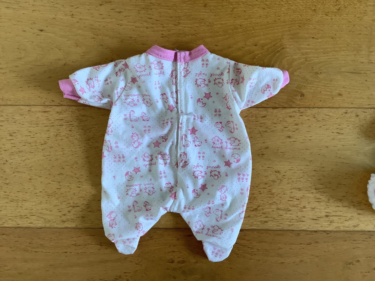 Slaappakje Baby Born met mutsje en slofjes