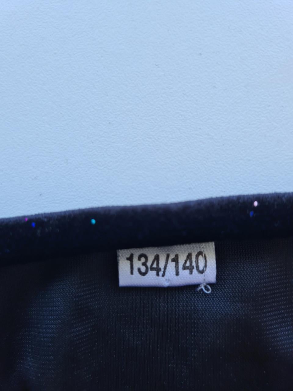 Zwart fluweel jurkje met glittertjes van Zeeman  Mt 134-140