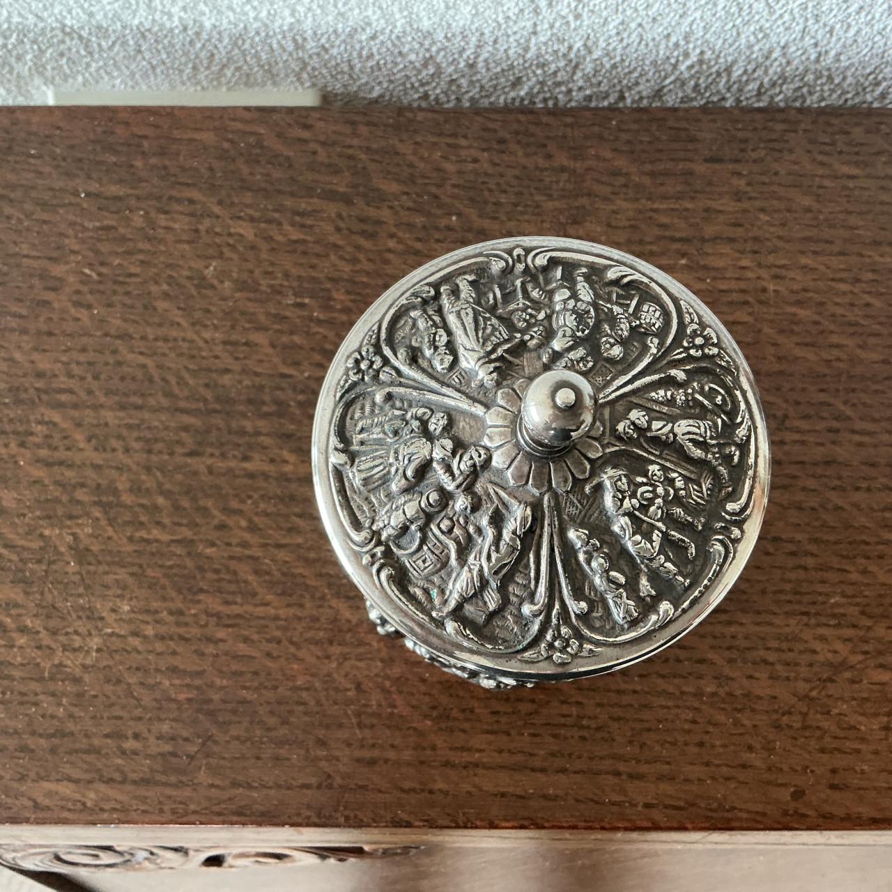 Verzilverd DE  busje.