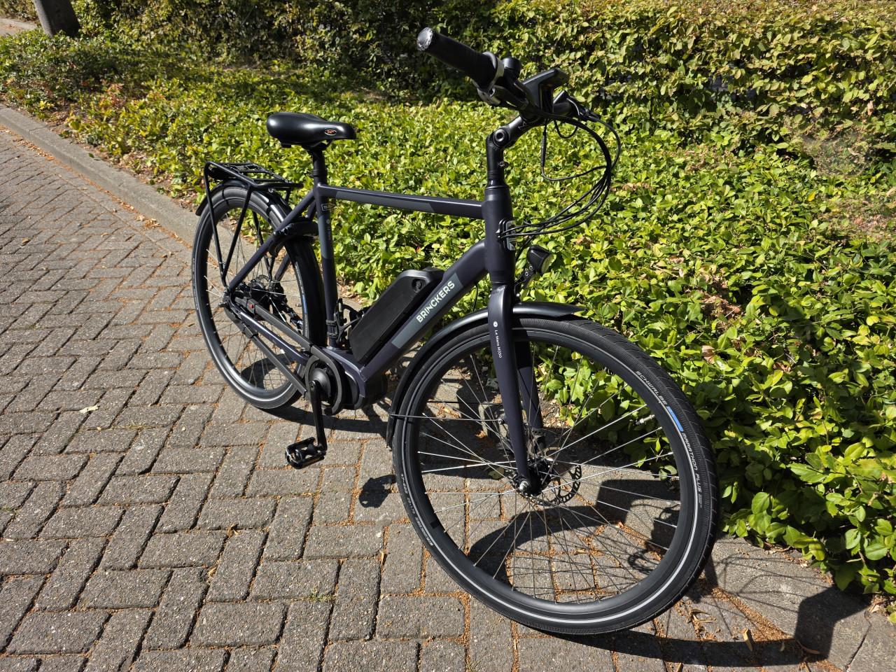 Keurig nette Brinckers elektrische heren fiets met middenmotor