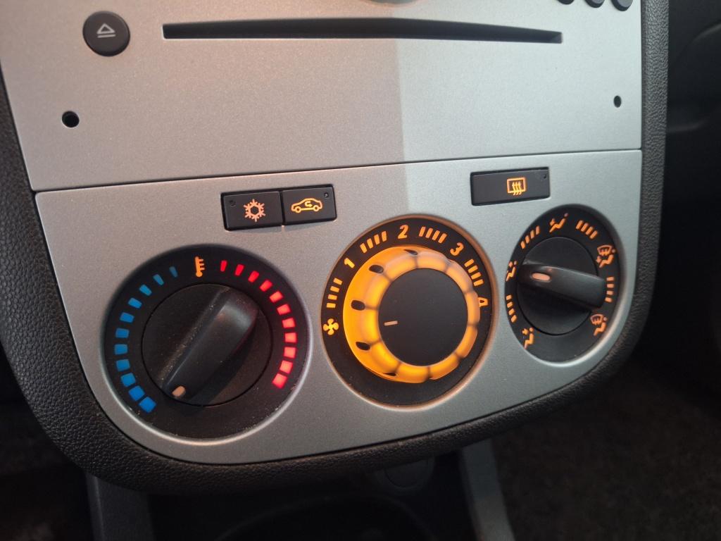 Opel Corsa 1.4-16v enjoy | trekhaak | airco | goed onderhouden |