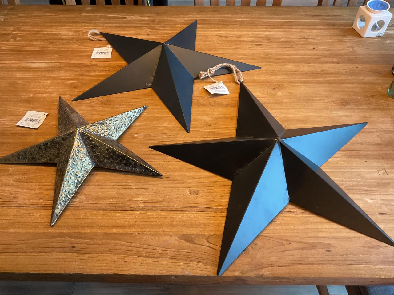 Kerst 2 zwarte en  goudkleurige stalen ster