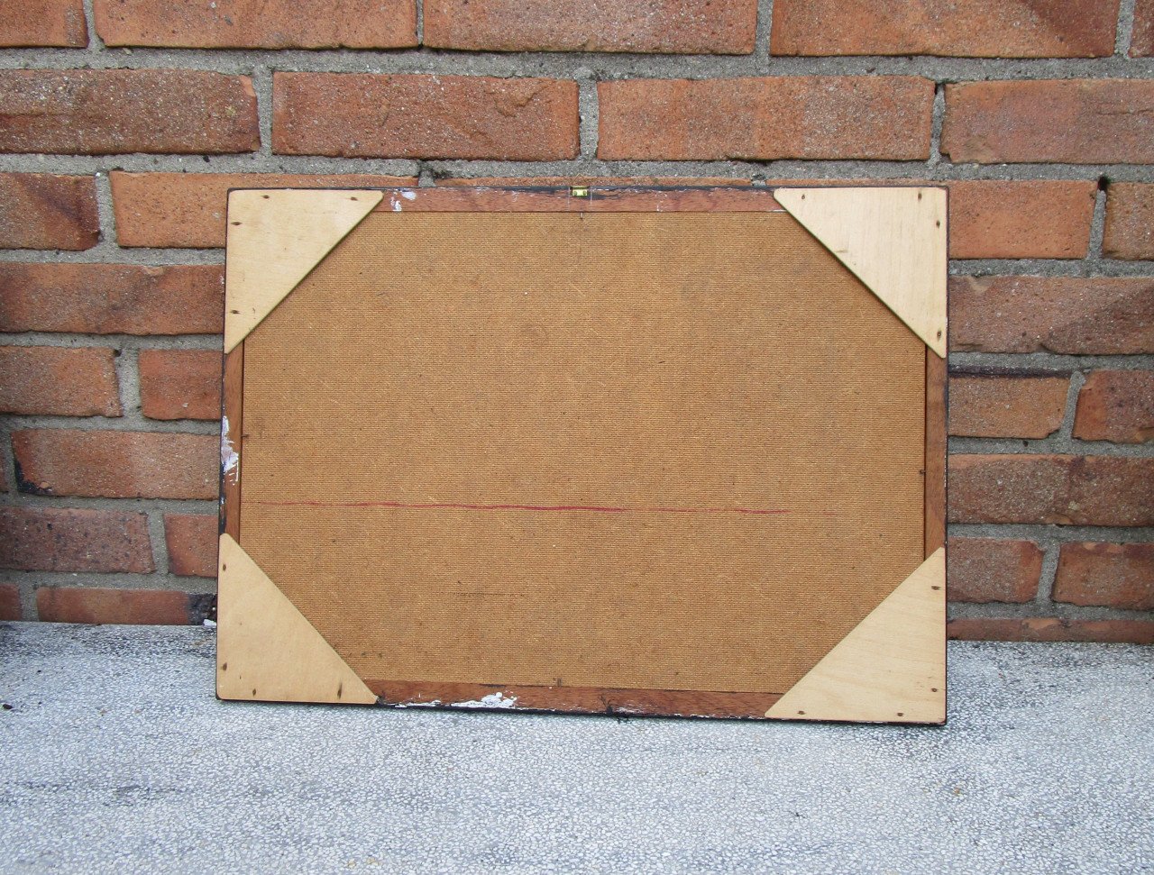 Ingelijste folder van dames badkleding achterontspiegelt glas.