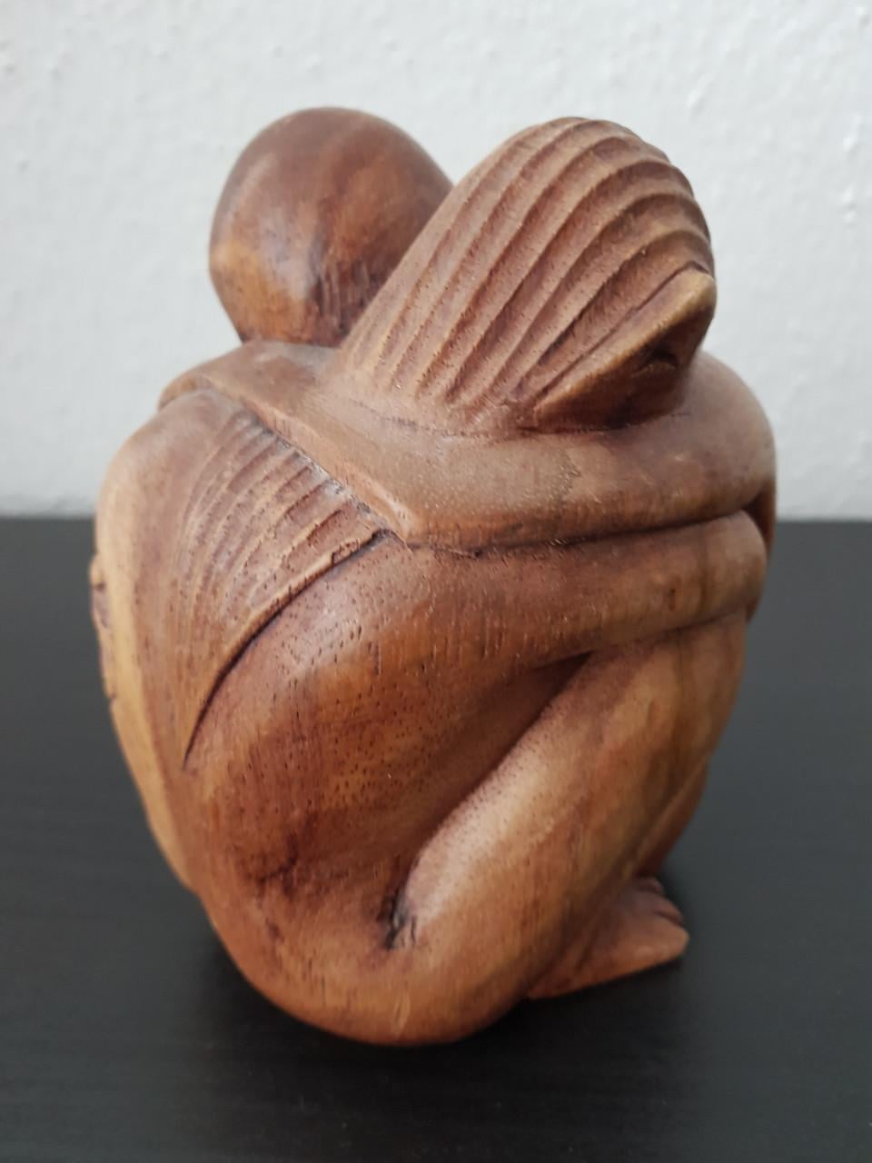 Balinees houtsnijwerk innig verbonden 15 x 15cm