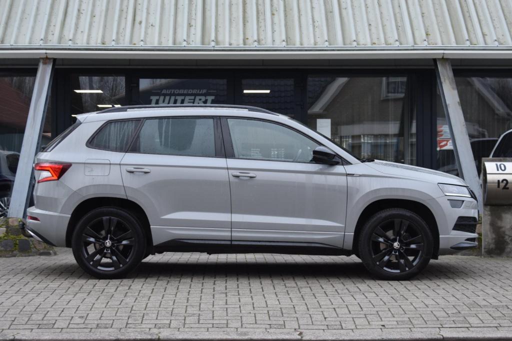 Skoda Karoq 1.5 tsi act sportline | trekhaak | camera | nap | canton | appl