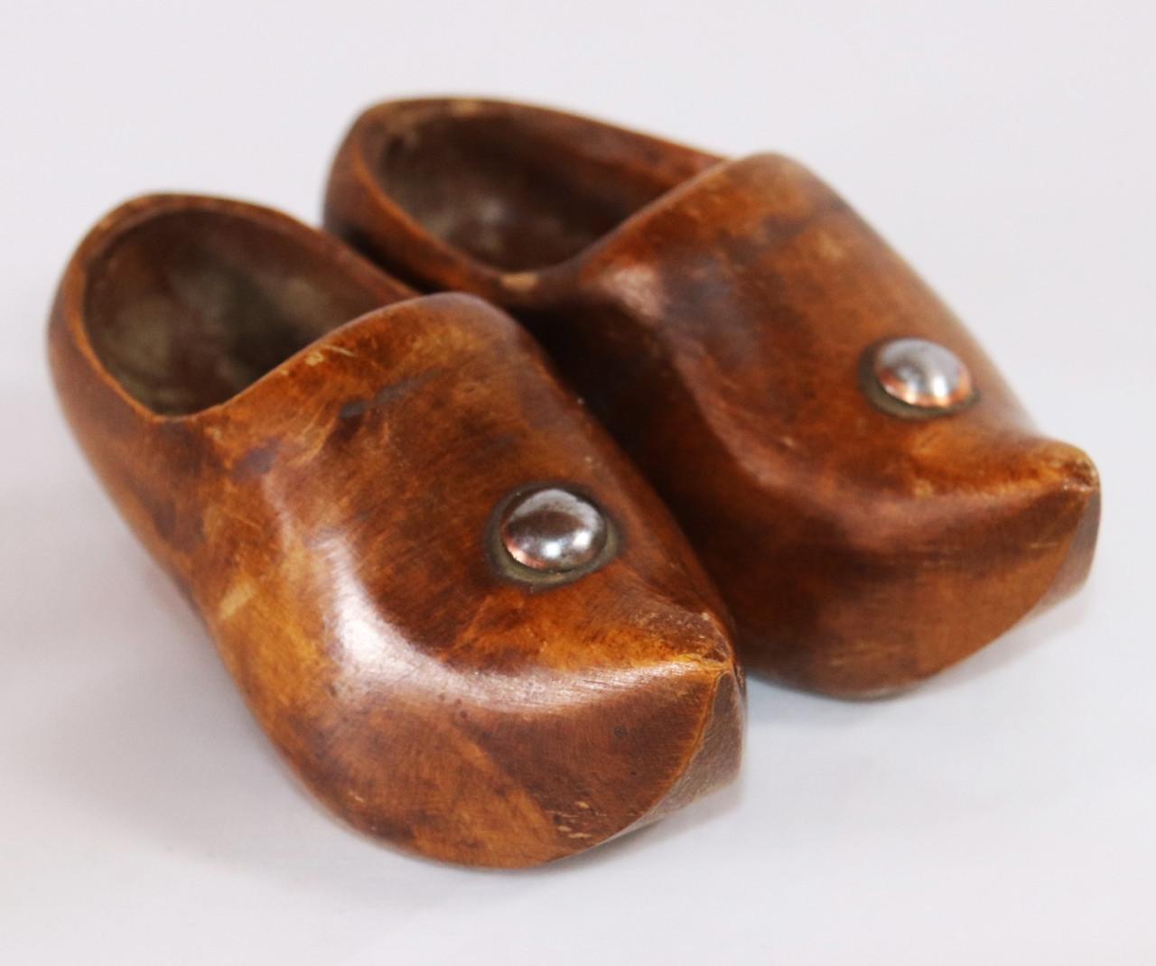 Kleine Houten kinder klompjes