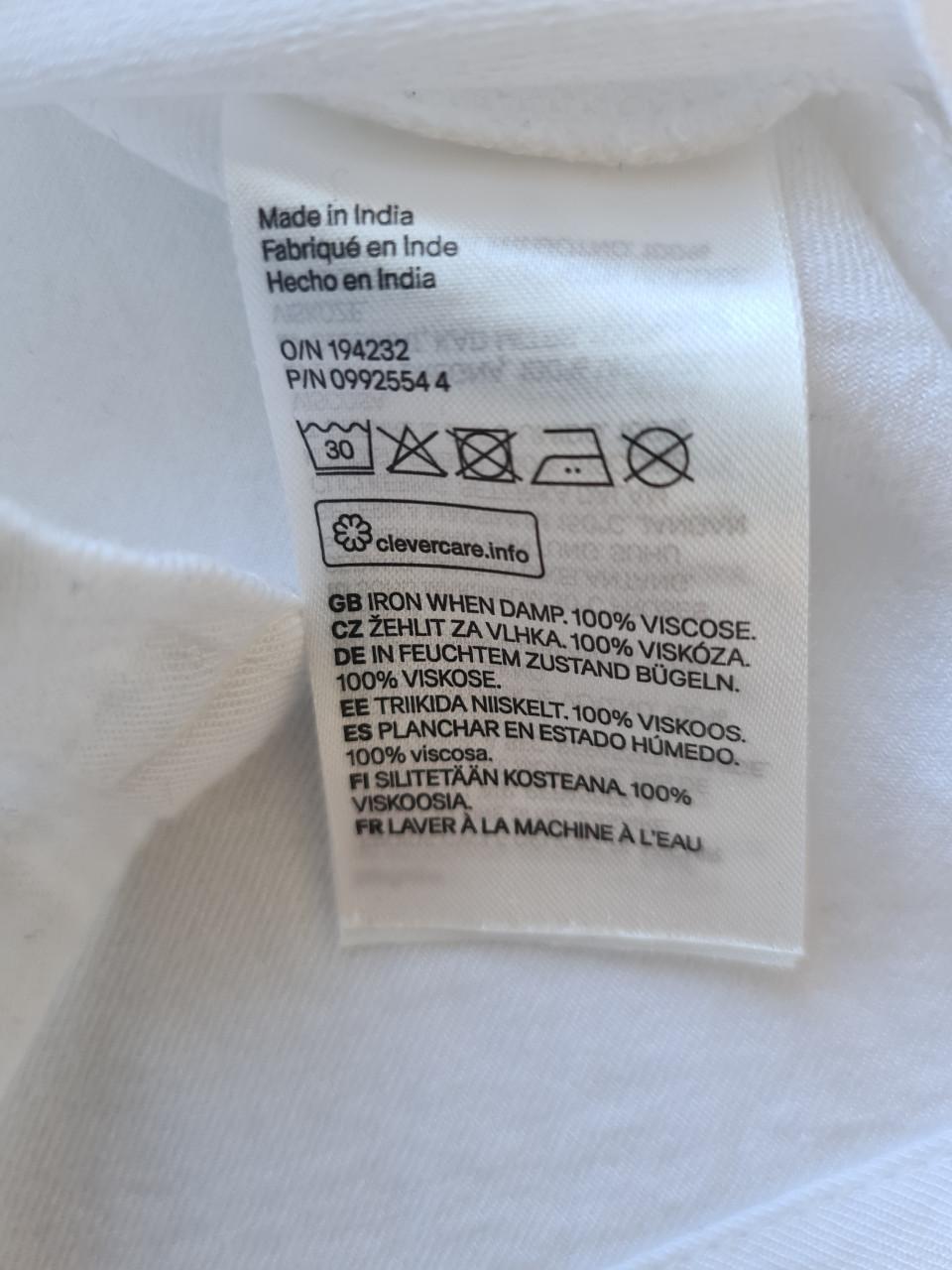 Mooi wit blousje met roezels van H&M Maat 134