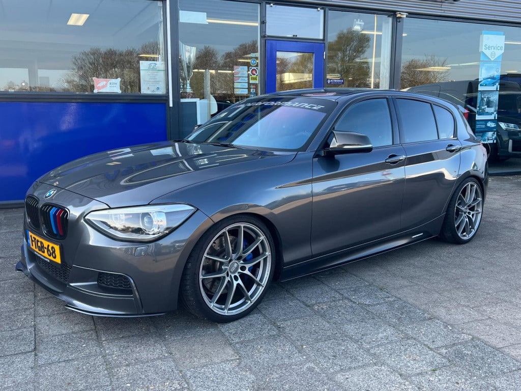 BMW 1 Serie m135i xdrive high executive, customized, stage 2 437 pk!