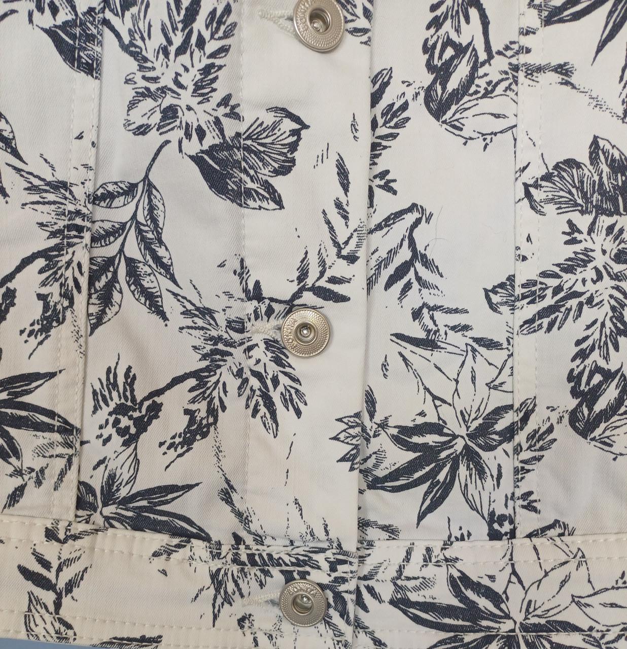 Denim jasje met blauwe bloemenprint maat 42