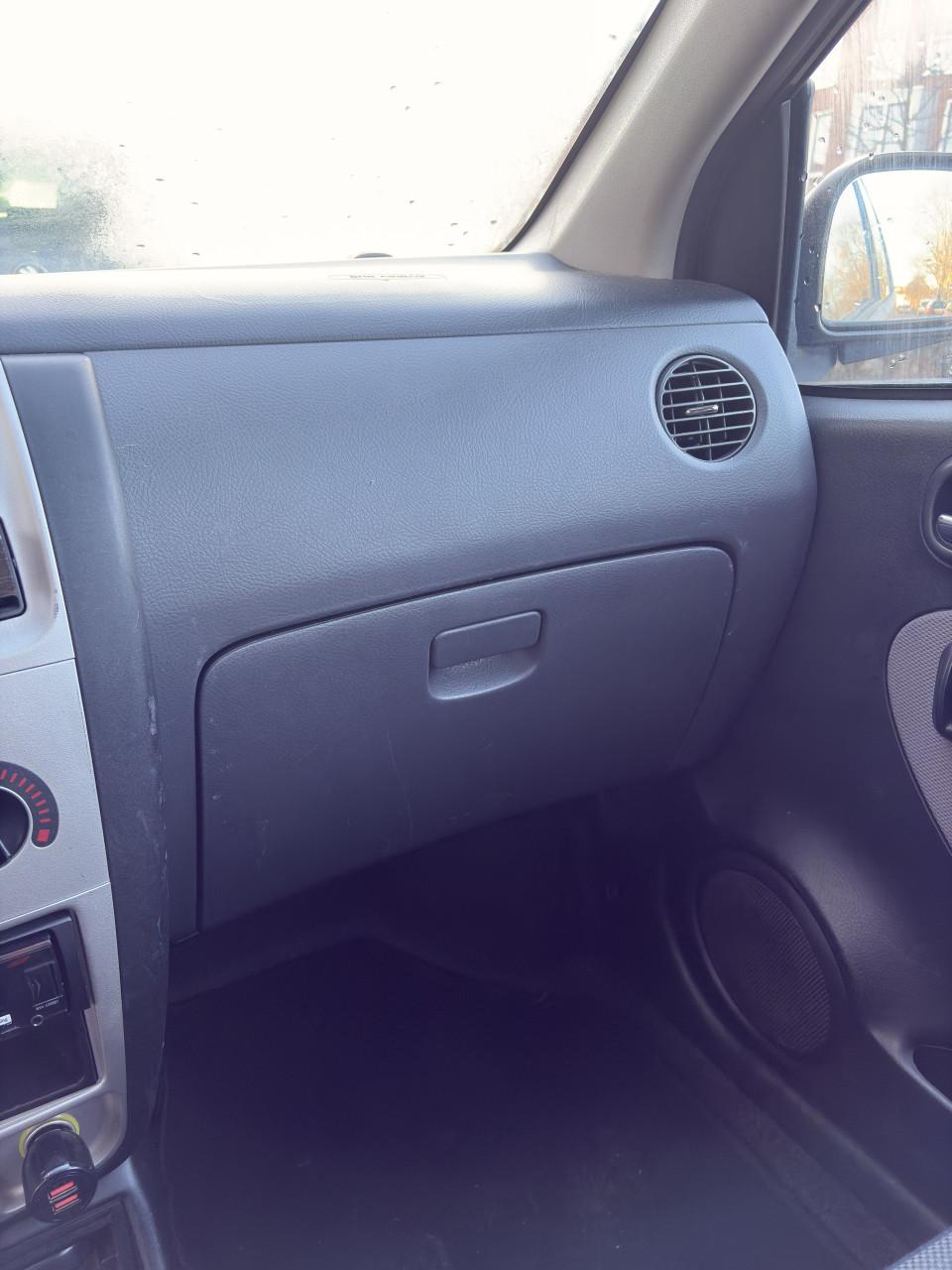 Daihatsu Cuore 1.0 3D 2007 Zwart