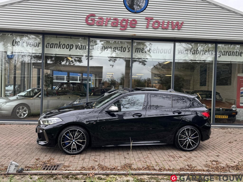 BMW 1 Serie m135i xdrive high executive edition pano orig.nl
