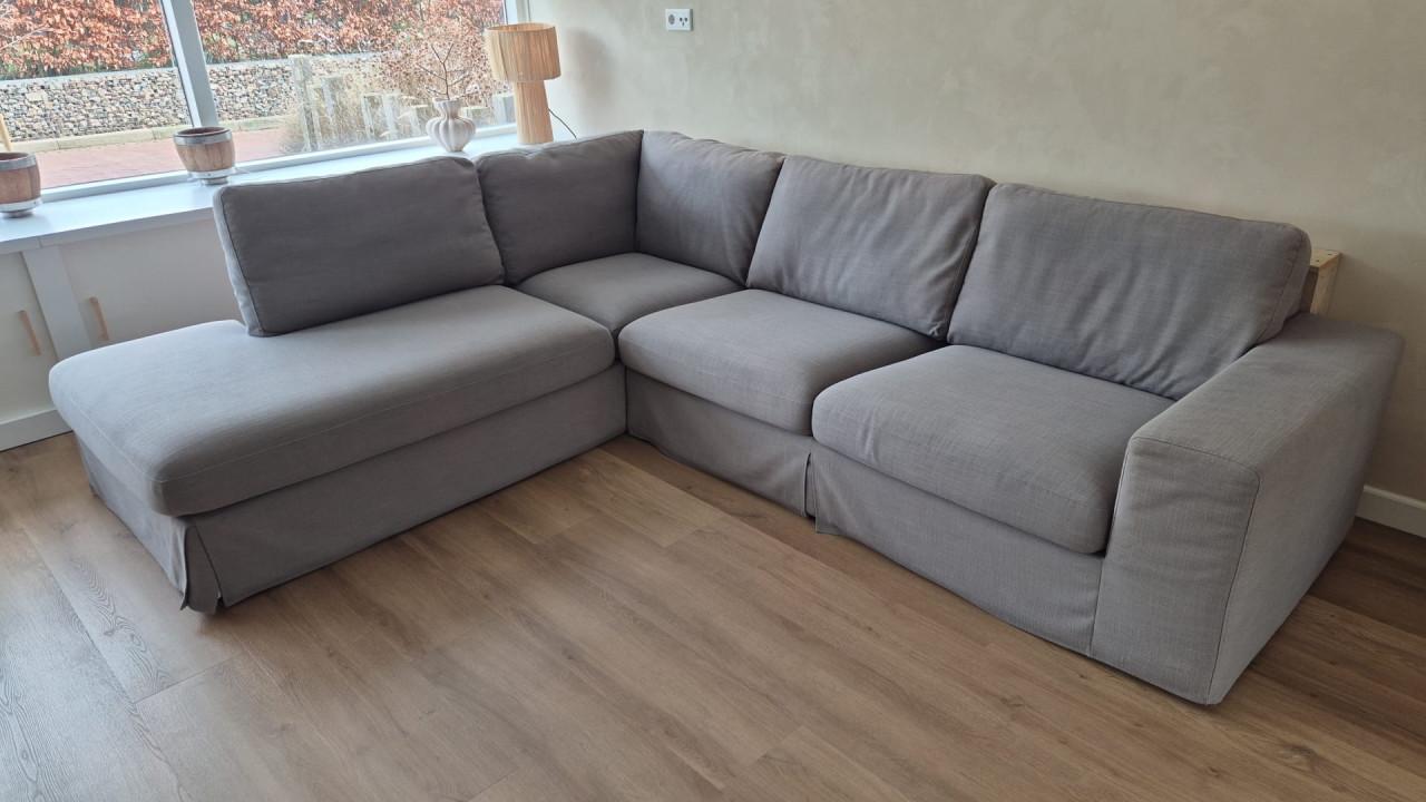 Grijze stoffen hoekbank