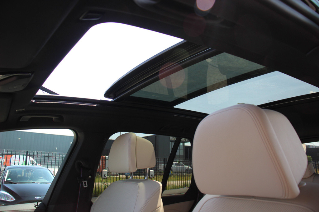 BMW X5 xdrive45e high executive m-sport | pano | luchtvering | 360 camera |