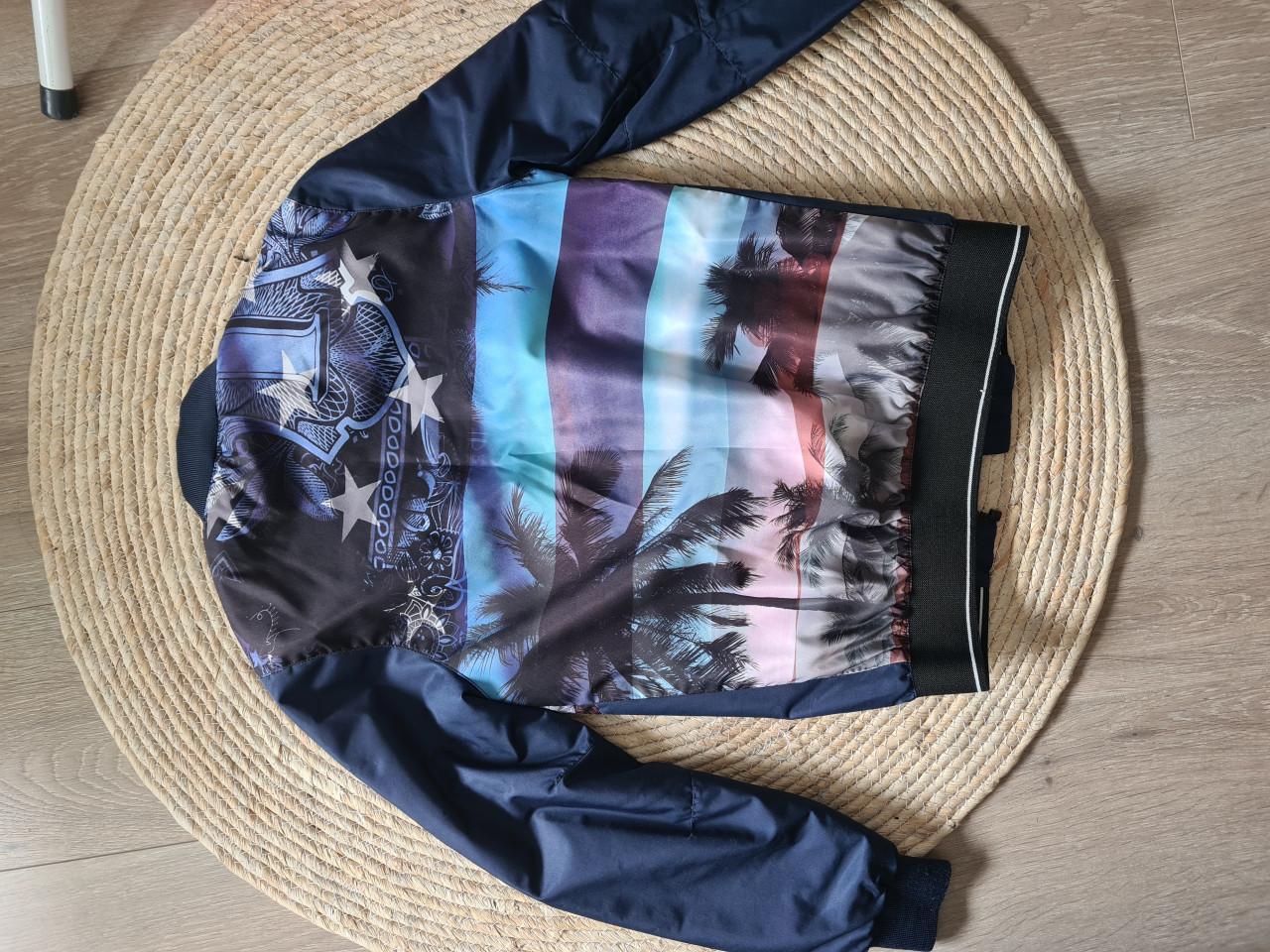 Nieuwe tussenjas jongens maat 146/152