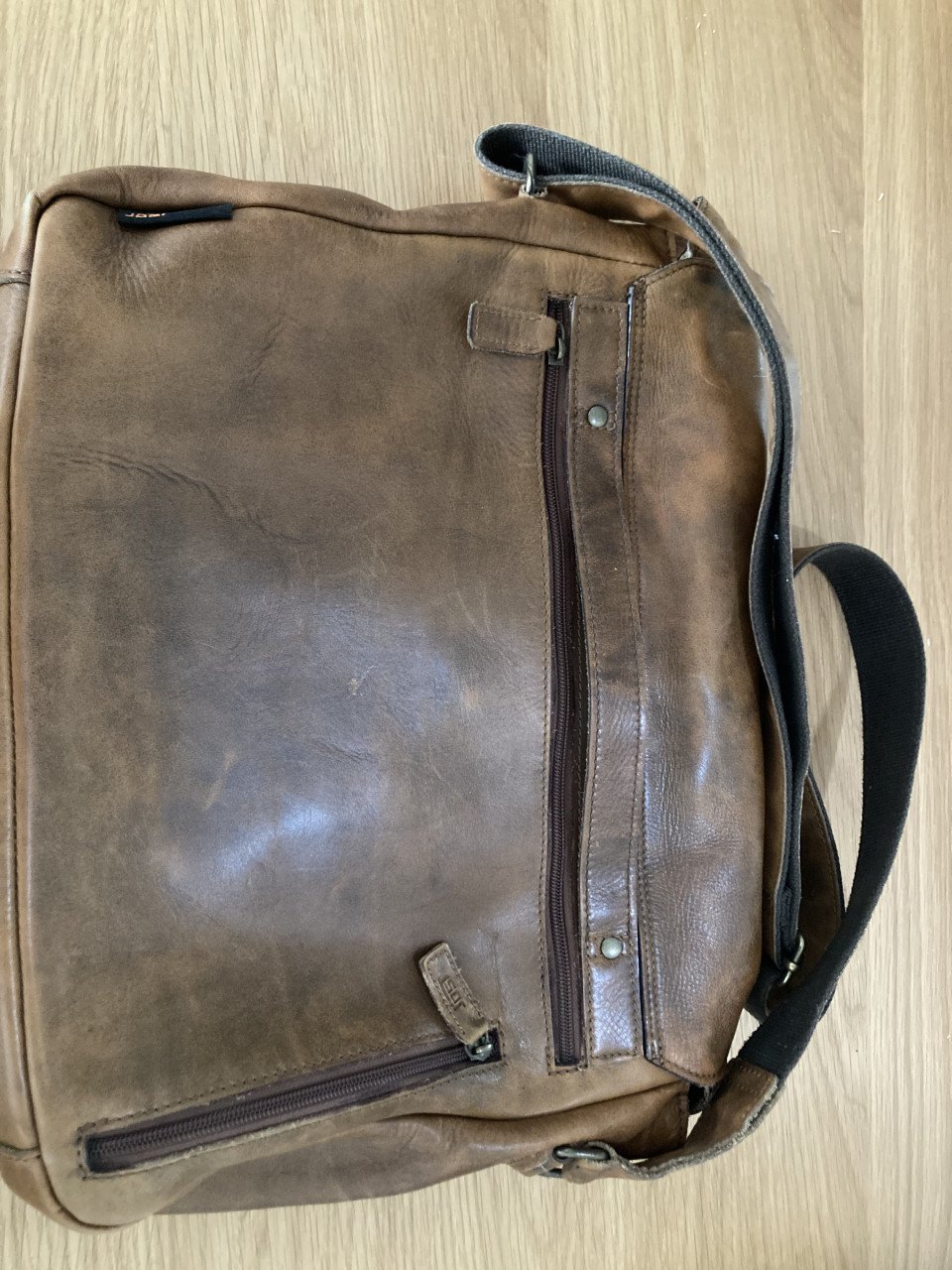 Bruin leren schoudertas voor school of werk