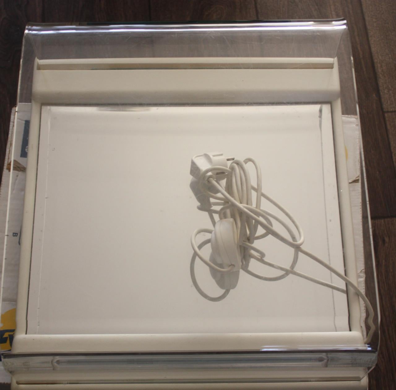 Methacrylaat podoscoop met groen licht.