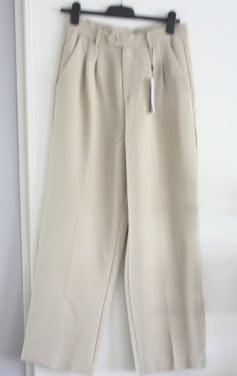 Nieuwe beige wijde pantalon maat 38