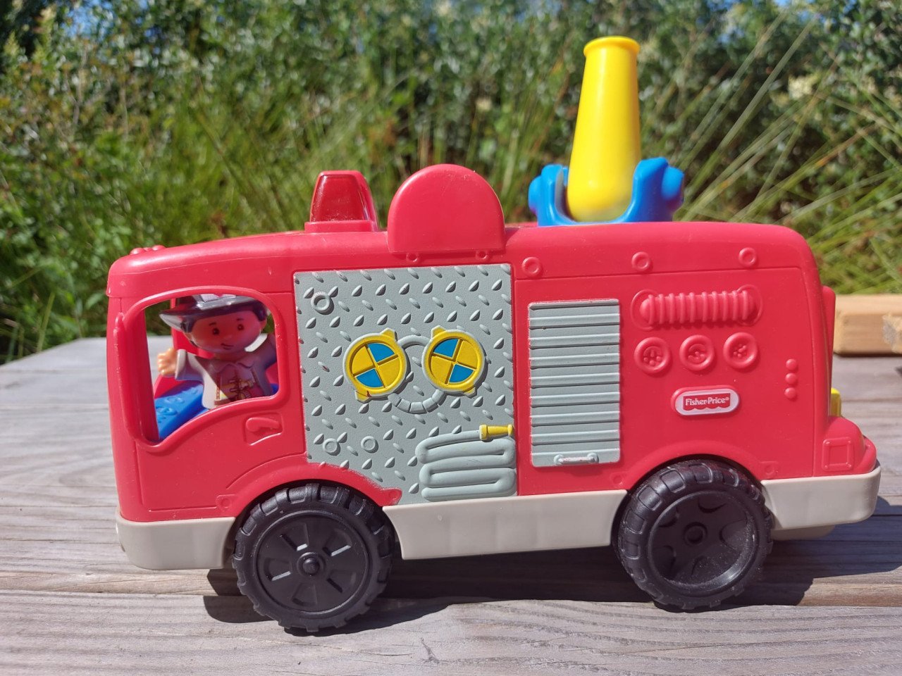 Mooie Fisher Price Little People Brandweerwagen met brandweerman