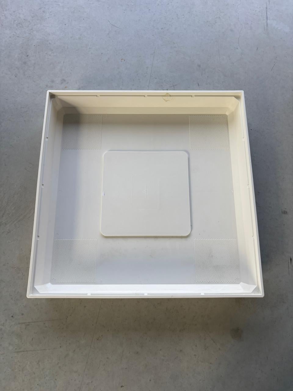 Wasmachine lekbak