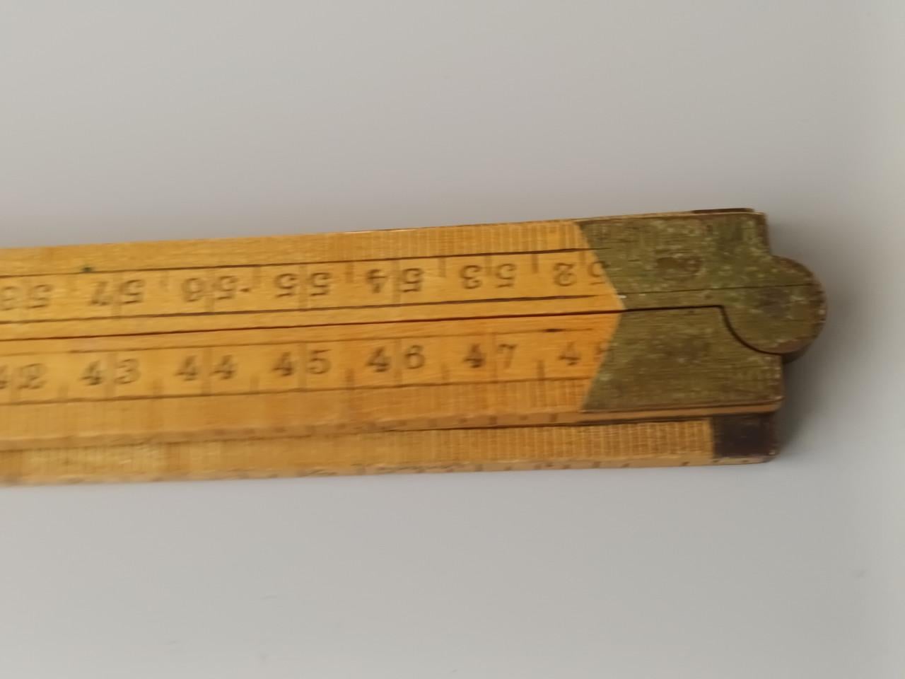 Oude houten duimstok