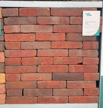Nieuw gebakken klinker paars/rood
