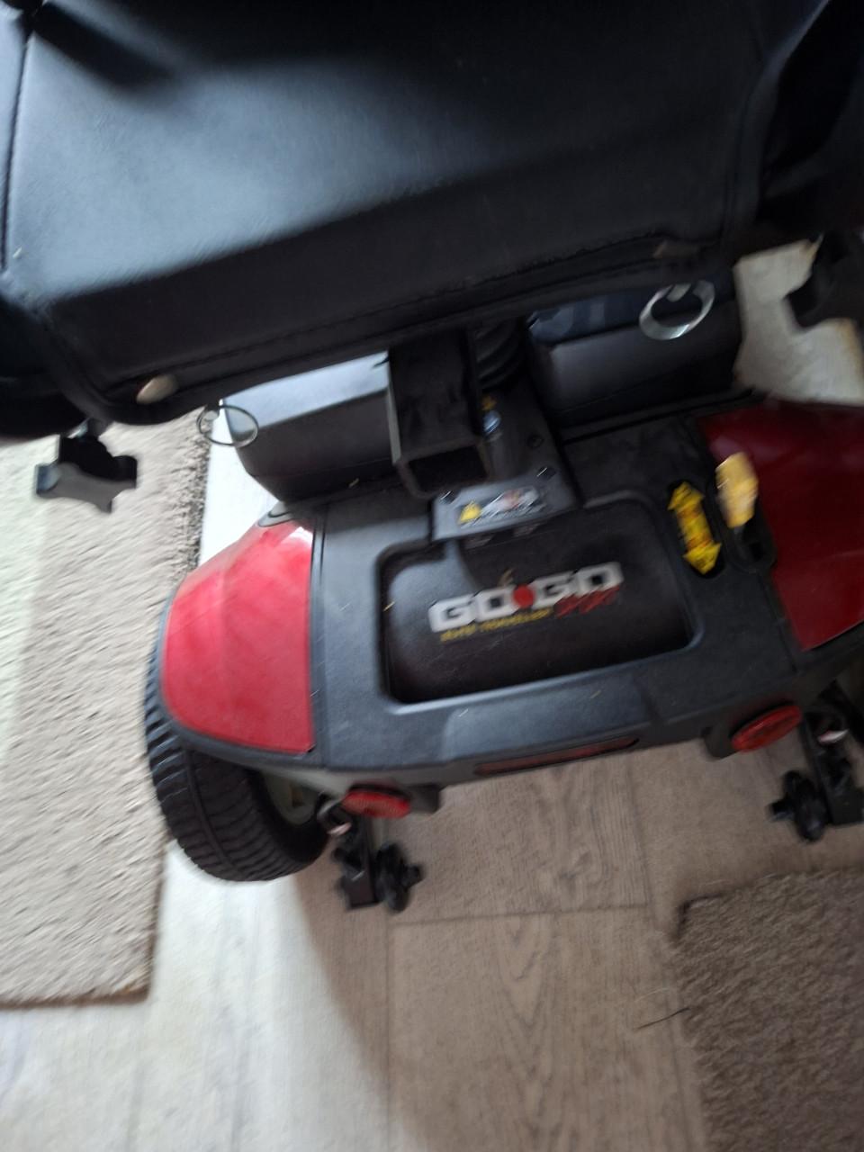 Scootmobiel in klapbaar ken in ierde auto