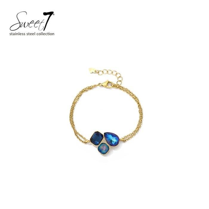 Armband met blauwe kristallen en goudkleurige schakel