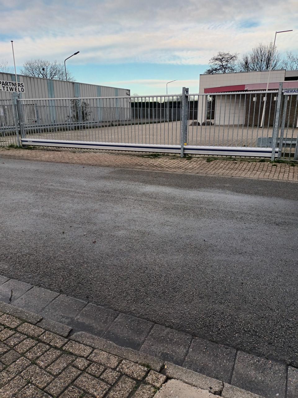 Heras hekwerk met schuifpoort