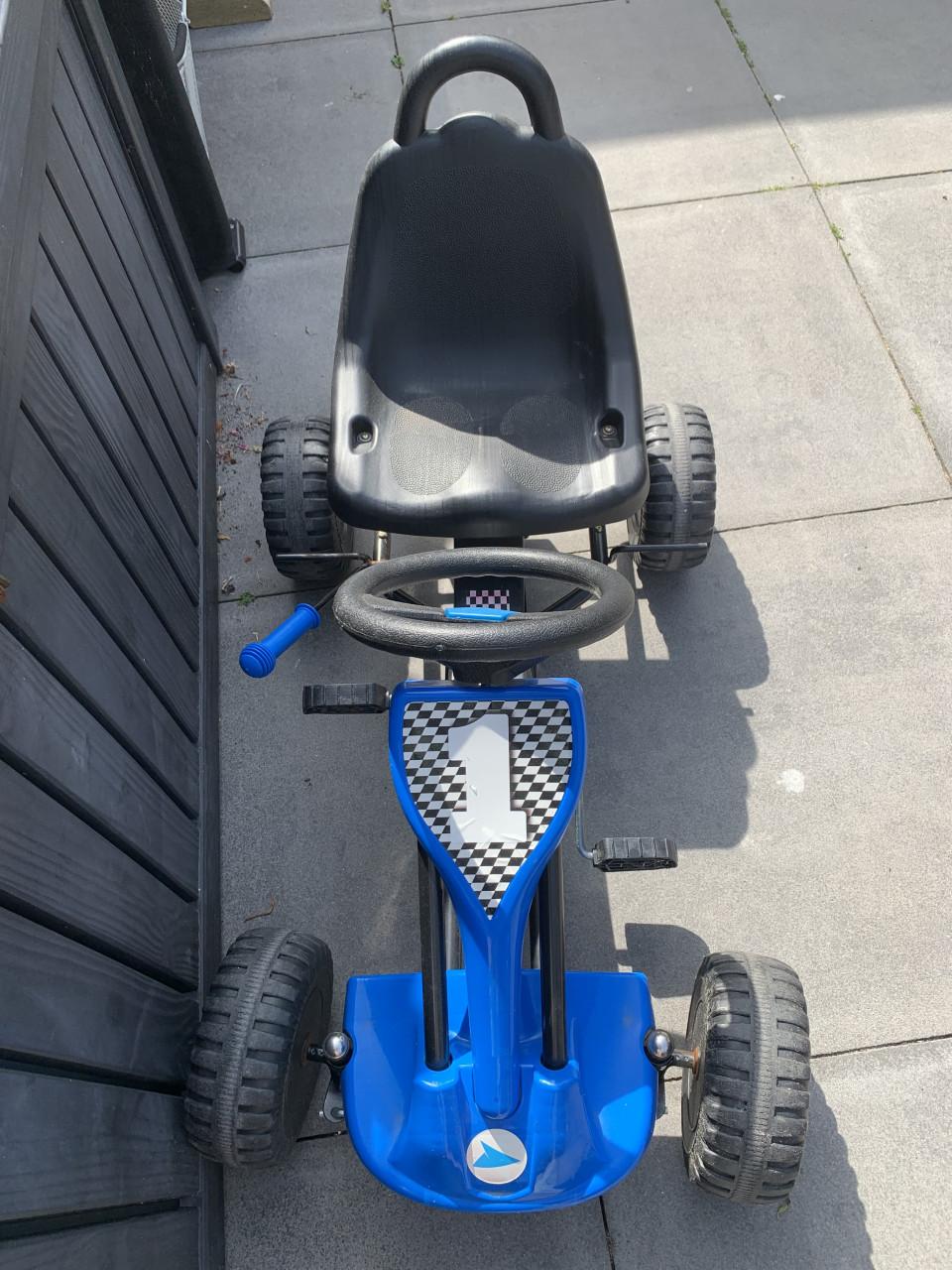 Robuuste blauwe skelter t/m 4 jaar ongeveer