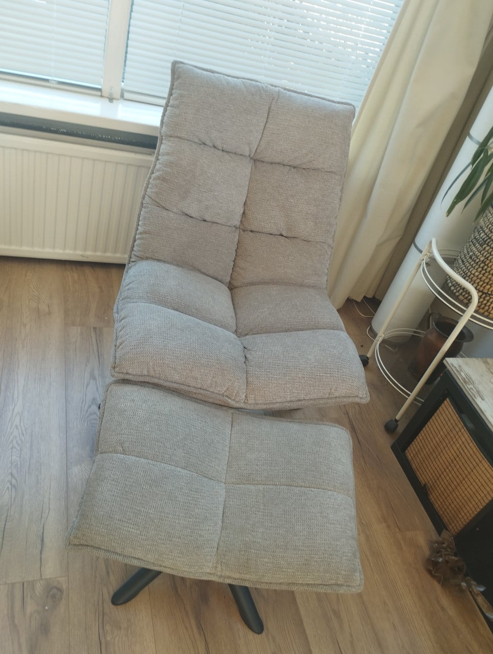Draaifauteuil met voetenbank