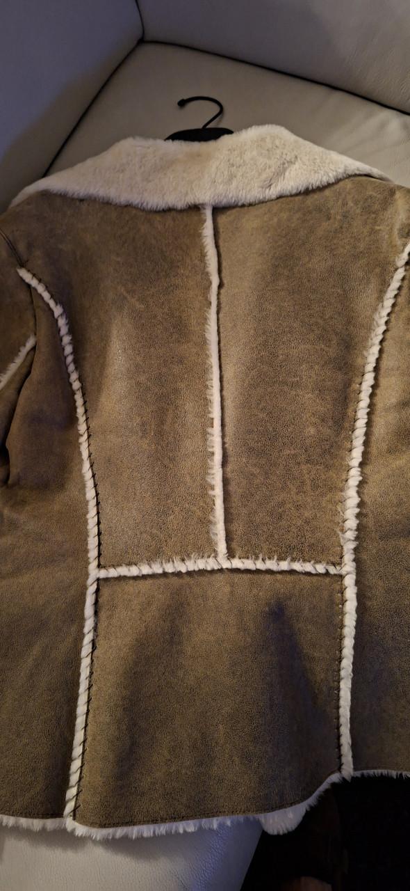 Stijlvolle shearling jas - warm, chic & uniek