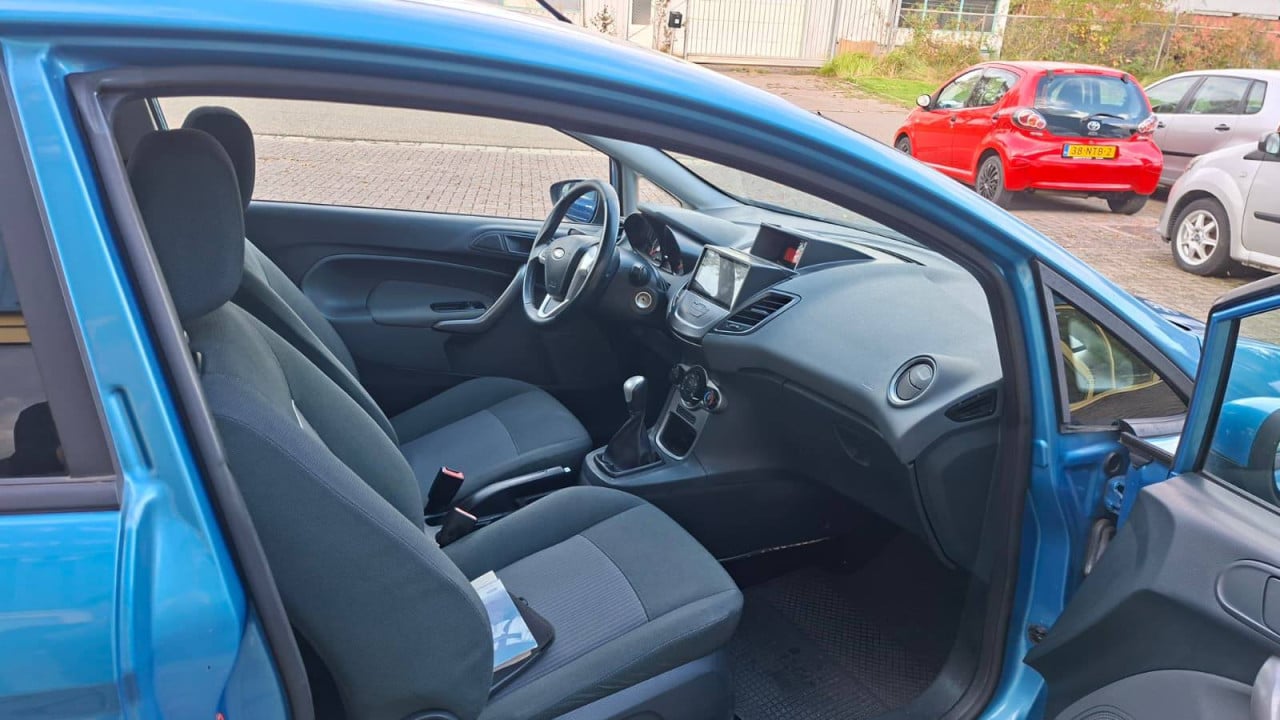Ford Fiesta 1.25 Titanium 3drs bj:2011 airco navigatie 121.000 km apk 2026