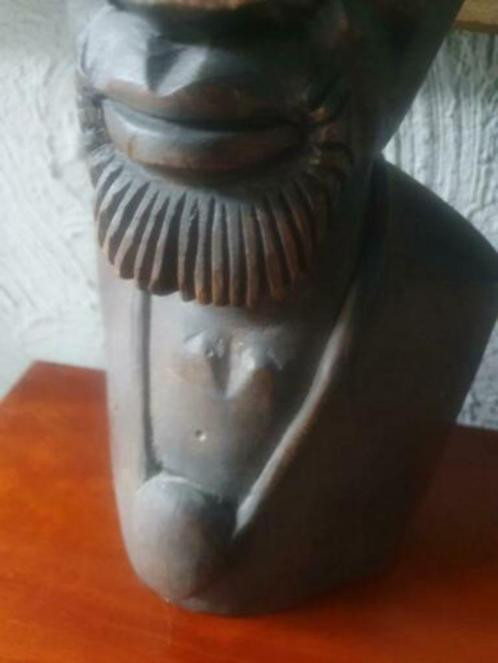 Heel mooi antiek houtsnijwerk beeldje uit indonesie van teak hout