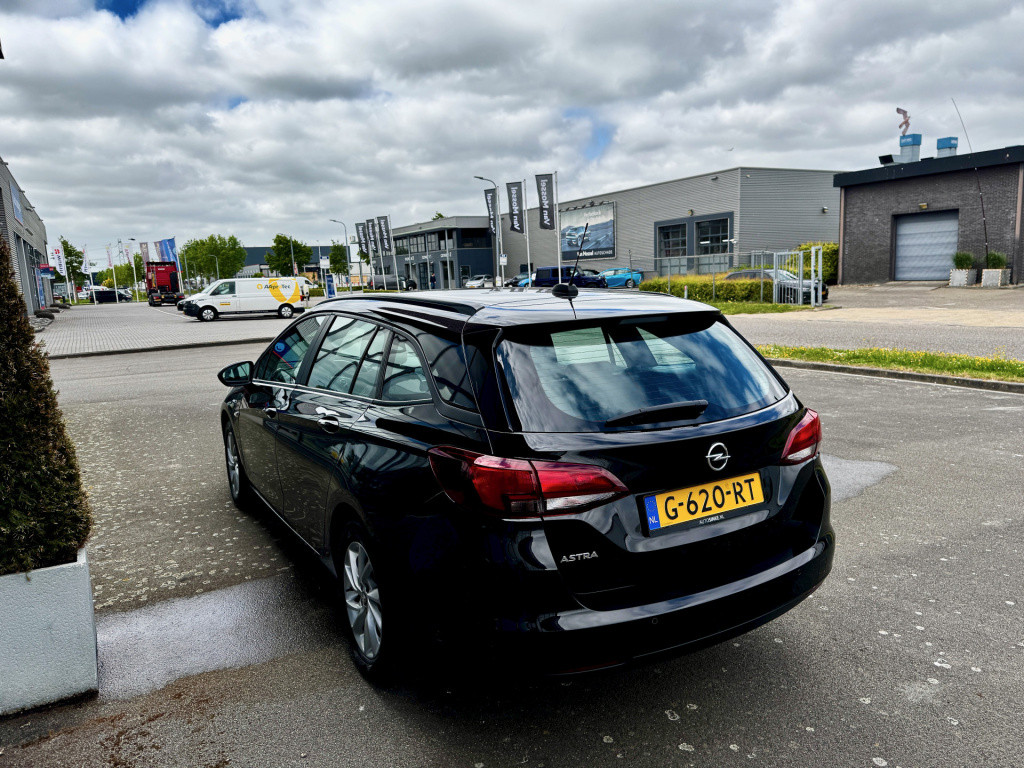 Opel Astra sports tourer 1.2 business edition+ navi ecc cruise