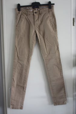 Bruine spijkerbroek maat 28-32