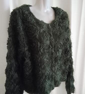 Prachtig groen apart jasje met rozenstructuur