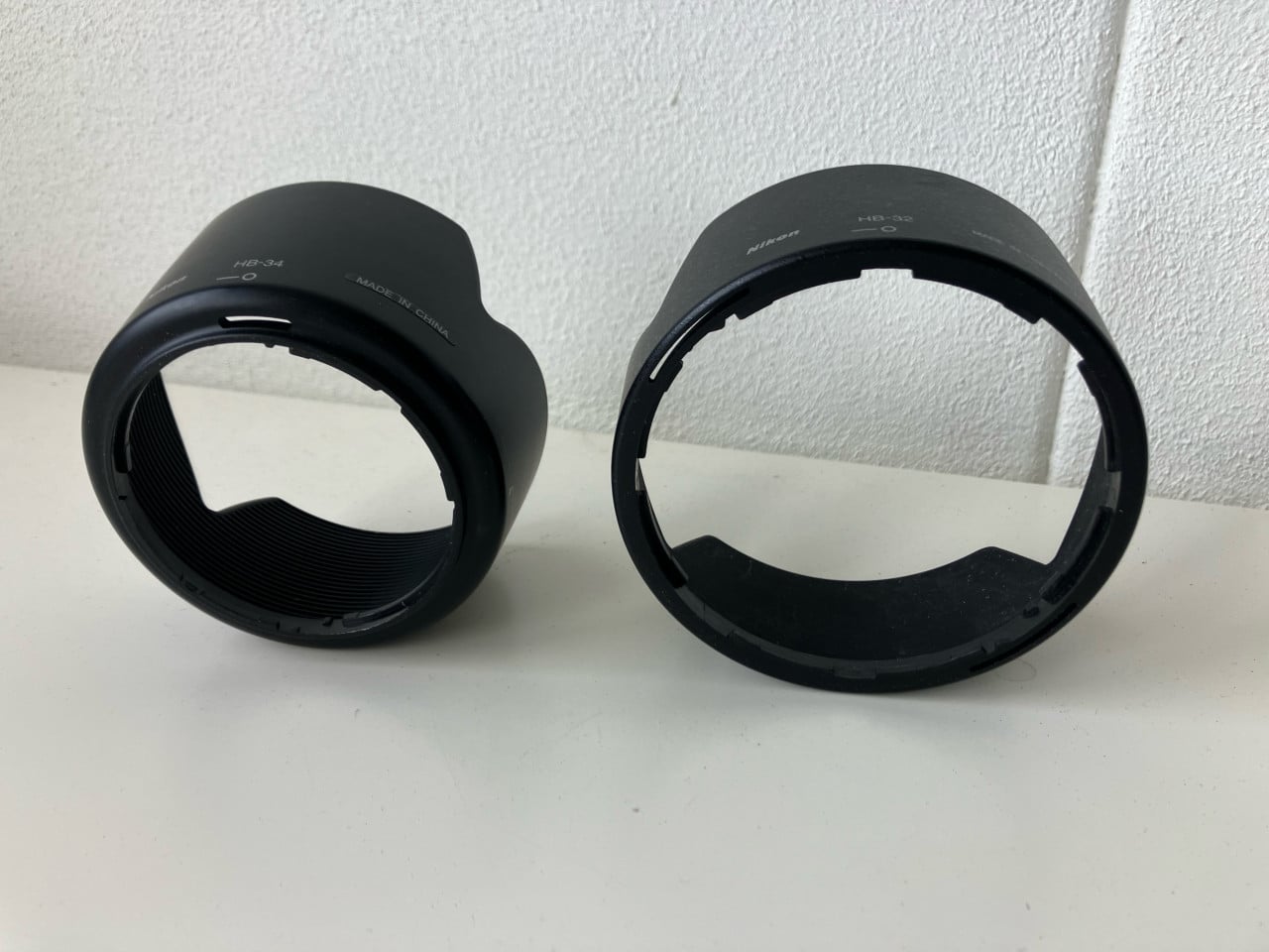 2x zonnekap Nikon