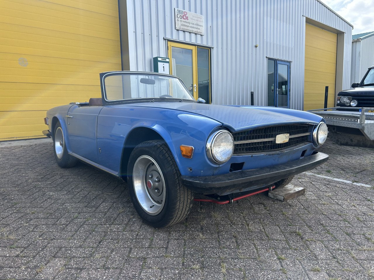 Triumph Herald 1965 en TR6 1973