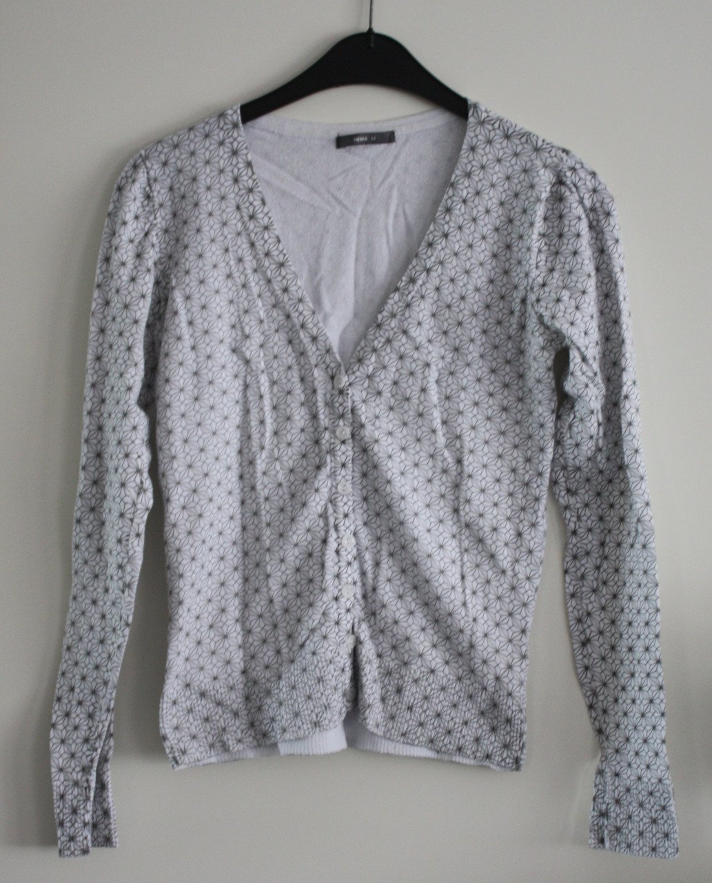 Witte vest met grijs werkje maat m