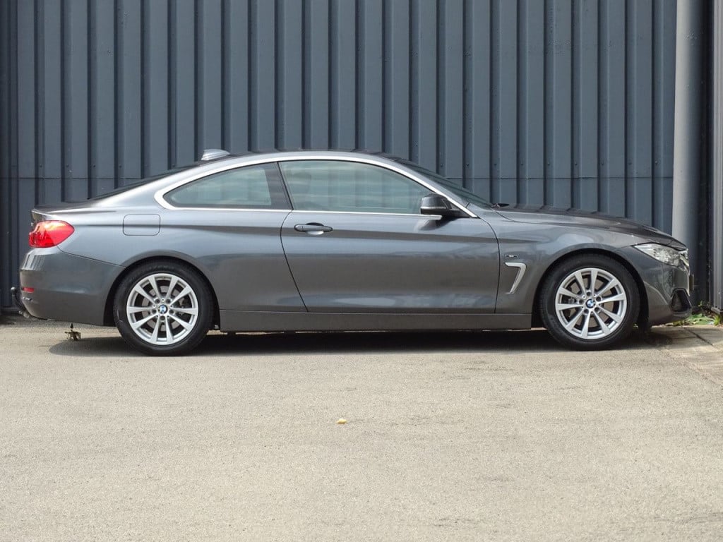 BMW 4 Serie coupé 428i high executive