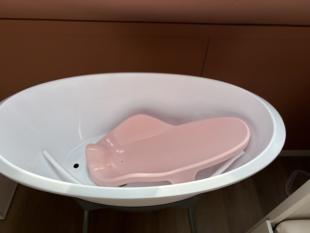 Babybadje met roze zitje