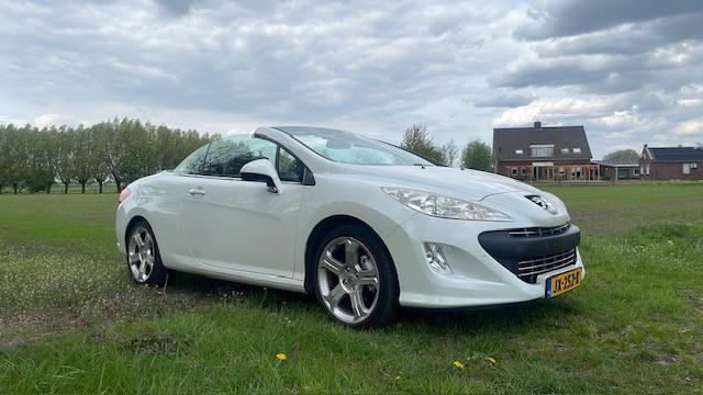 Zeer mooie peugeot 308cc cabrio parelmoet wit weinig km nu 5499 euro