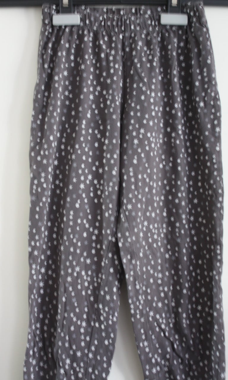 Pyama broek met stippen en sterren  maat 140