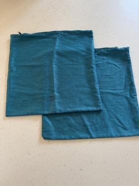 Twee kussenhoezen voor een bolus
