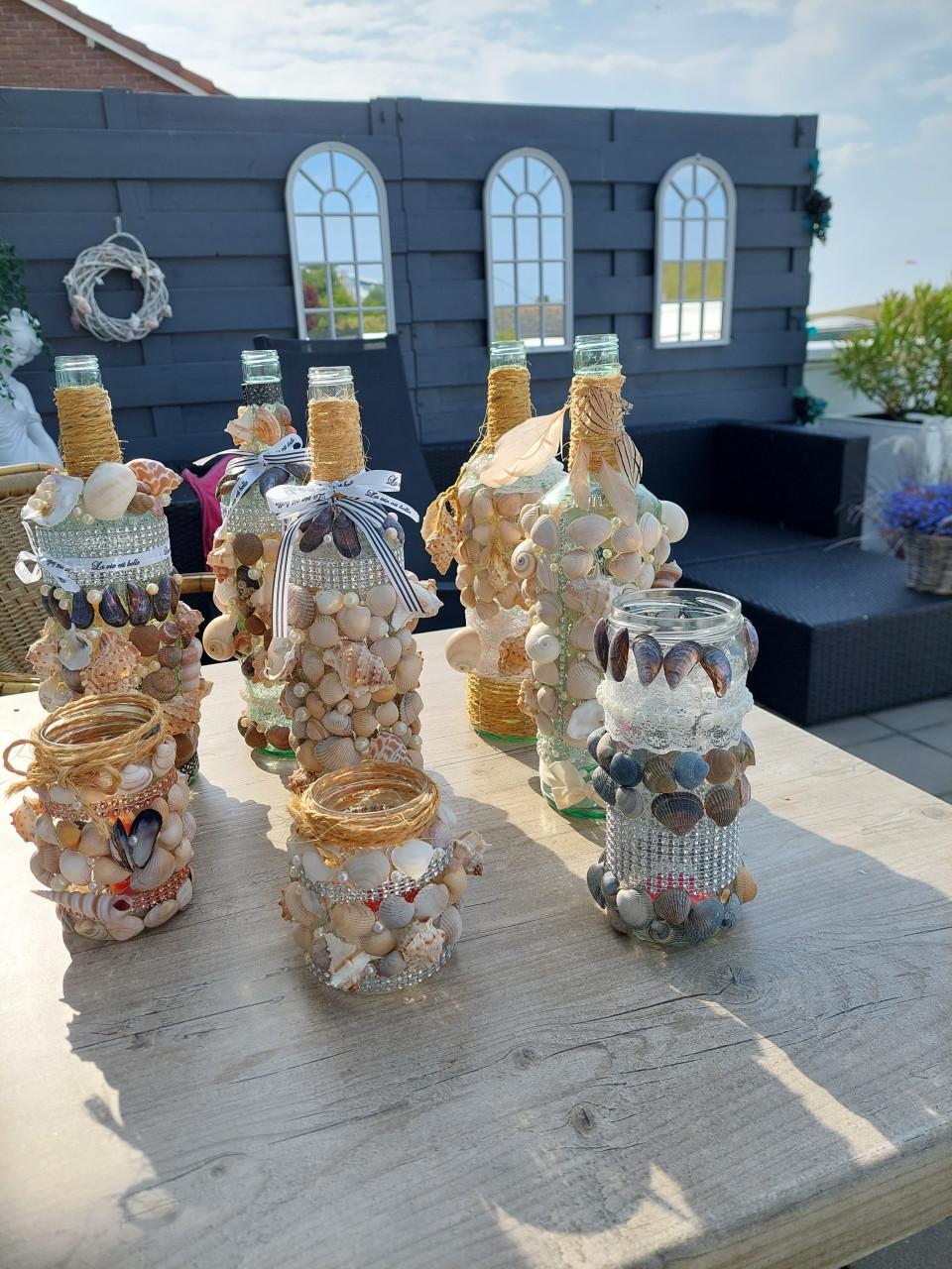 Unieke schelpen flessen decoratie