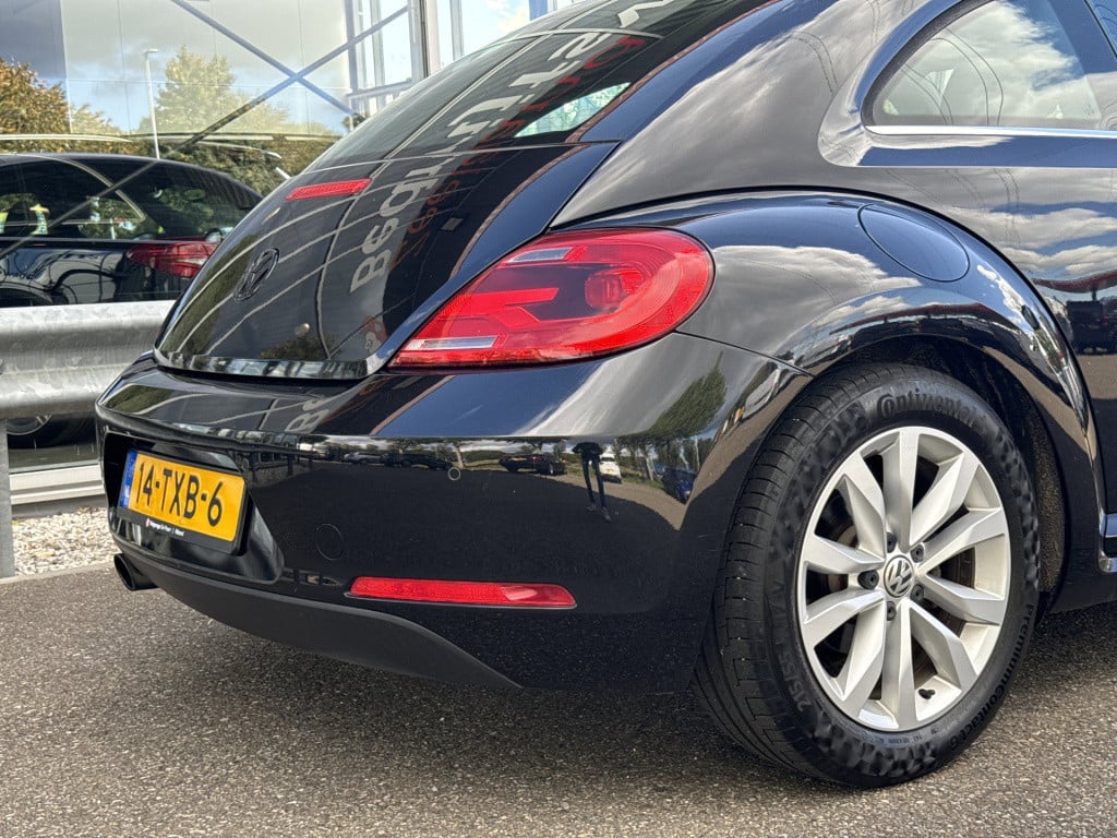Volkswagen New Beetle 1.2 tsi design | nl-auto | navi | airco | cruisec.