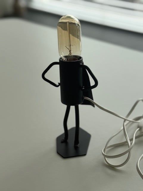 Smeedijzeren lampje (man met cape)