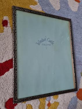 Fotolijst met metalen , versierde rand