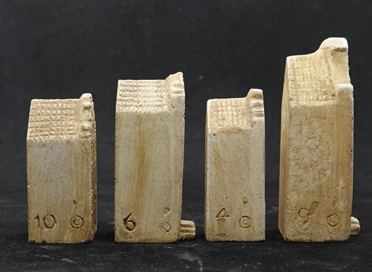 4 miniatuur grachtenhuisjes Amsterdam, serie copyright